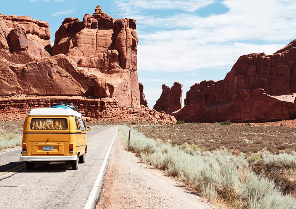 VW Bus on a desert road